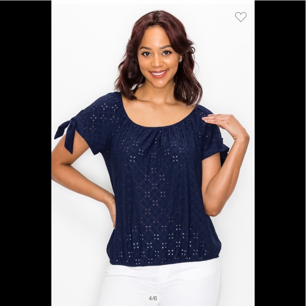 Eyelet knit boat neck tie sleeve top.